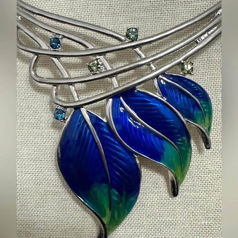 Statement necklace with brilliant blue and green enamel leaves - Picture 2 of 4